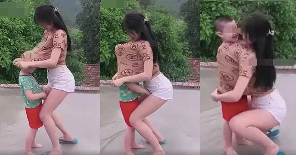 Cô gái trẻ kéo áo trùm lên đầu bé trai khiến nhiều người bức xúc: 'Trẻ con như tờ giấy trắng, làm ơn...' Ảnh 1