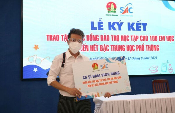 Đàm Vĩnh Hưng nhận bảo trợ học tập trong suốt 6 năm liền cho 100 trẻ em mất cha mẹ vì Covid-19 Ảnh 2