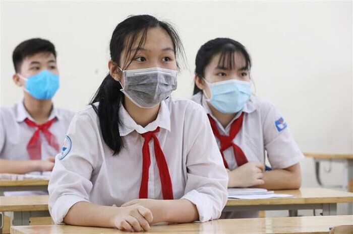 Học sinh cả nước trở lại trường sau kỳ nghỉ Tết Nguyên đán Ảnh 1