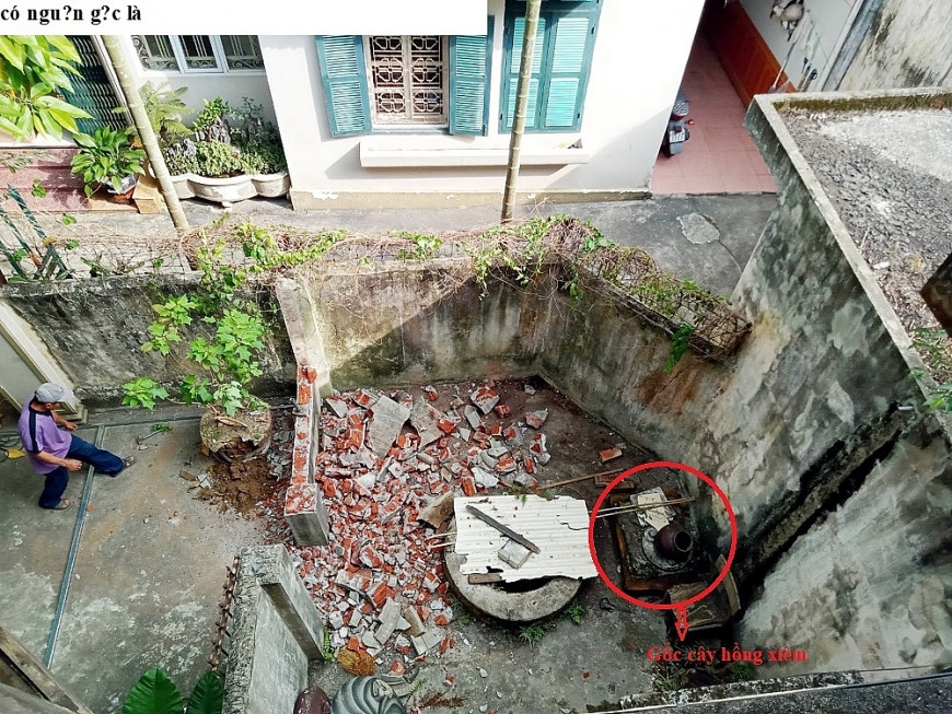 1-Khuon vien gieng nuoc bi gia dinh ong Huy dap pha