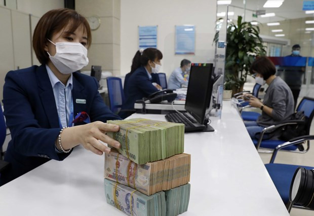 Tu ngay 25/5, cac muc lai suat dieu hanh se giam them 0,5% hinh anh 1