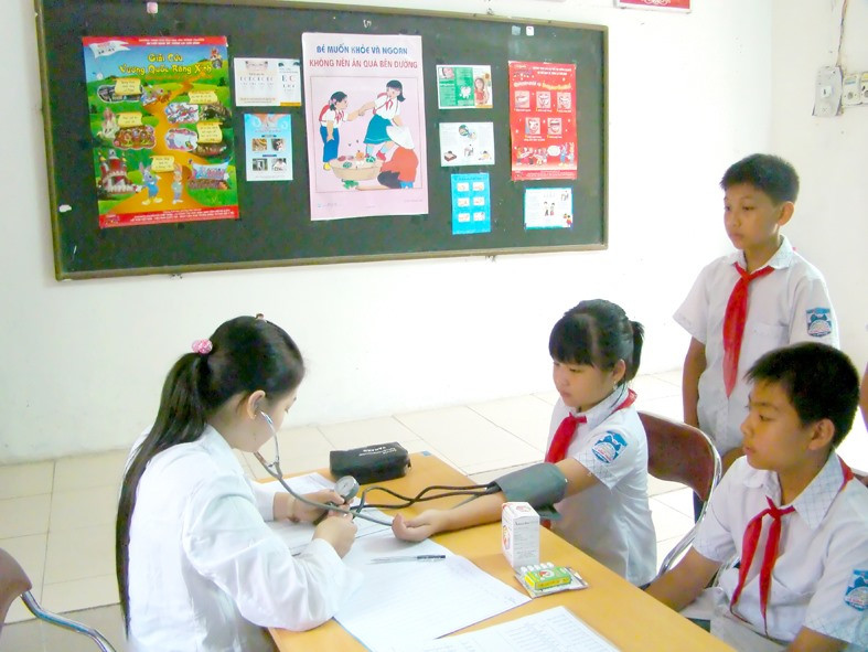 Mức đóng bảo hiểm y tế học sinh, sinh viên từ 1/7 - Ảnh 1.