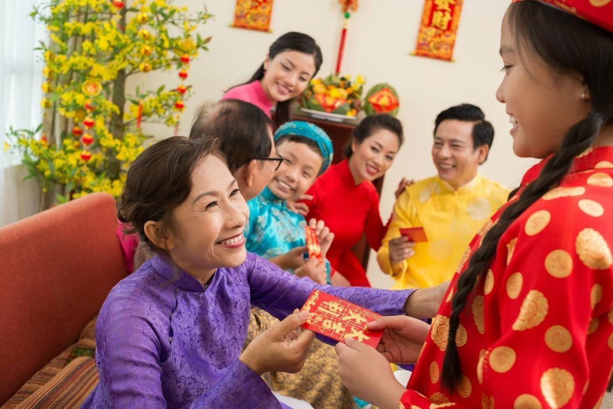 Nét đẹp văn hoá trong phong tục lì xì đầu năm mới của người Việt Ảnh 2