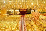 Tin tài chính hôm nay 20/12: Giá vàng neo cao, USD hạ nhiệt