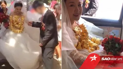 Thấy cô dâu đeo tới 60kg vàng trên người, khách mời lo lắng hỏi: 'Em có bị đau vai không?'
