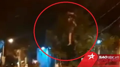 Clip: Gã đàn ông có biểu hiện bất thường nhào lộn trên đường dây điện lúc 2h sáng
