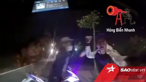 Clip: Nhóm thanh niên hung hăng chặn đầu ô tô trong đêm, liên tục chửi bới rồi cầm gạch đập phá xe