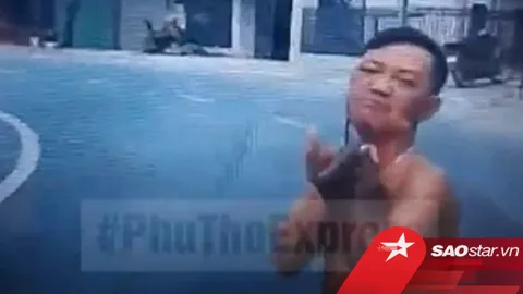 Người đàn ông bất ngờ chặn đầu ô tô, cầm vật giống súng chĩa thẳng tài xế dọa bắn