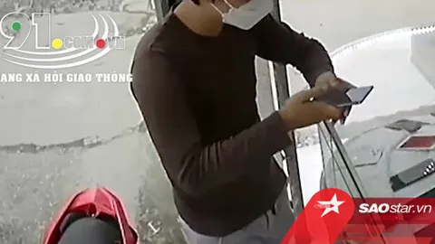 Clip: Nam thanh niên vờ hỏi mua điện thoại rồi cầm chạy mất, chủ cửa hàng 'phi' qua tủ kính đuổi theo