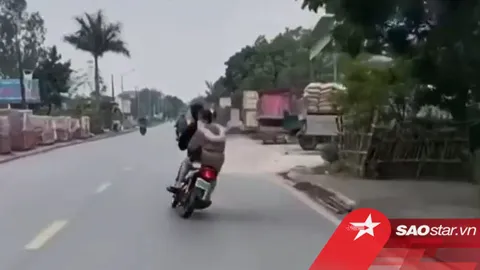 Clip: Thanh niên đầu trần chở theo bạn gái đánh võng, điên cuồng rung lắc xe như làm xiếc giữa đường
