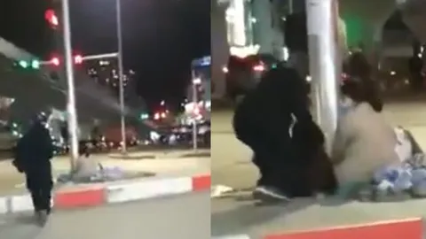Clip: Ấm lòng với hình ảnh chàng trai giúp đỡ em bé ngủ ngoài đường giữa đêm đông giá buốt
