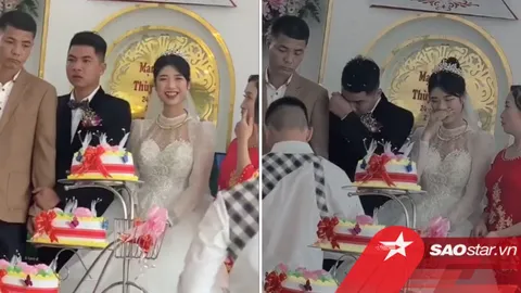 Chú rể nắm chặt tay bố lau nước mắt bên cạnh cô dâu cười tươi, biểu cảm của người bố càng gây chú ý