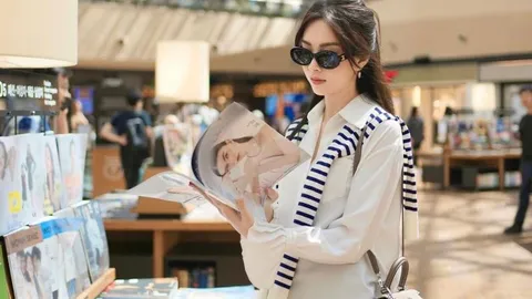 Đặng Thu Thảo ẵm trọn điểm 10 ứng xử khi bị nói đến thư viện chỉ để chụp ảnh