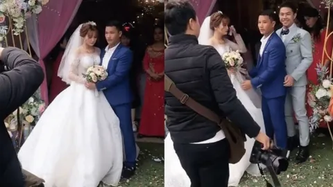 Ông bố trẻ tuổi đứng chụp ảnh với con gái trong lễ cưới khiến tất cả lầm tưởng là... chú rể