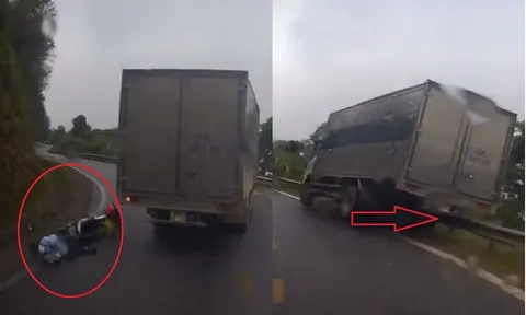 Vượt ẩu, xe tải gây họa cho xe máy rồi suýt lao xuống vực