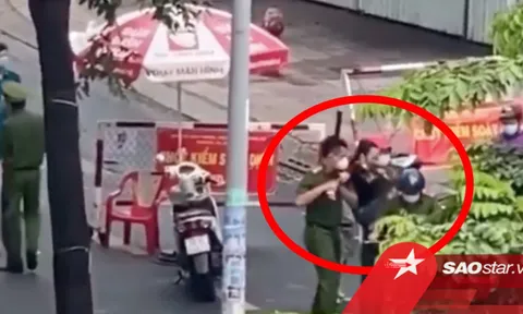 'Chị đại quận 4' lại tiếp tục gào thét chống đối khi bị 'bế' lên phường do vi phạm quy định phòng dịch
