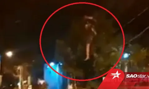 Clip: Gã đàn ông có biểu hiện bất thường nhào lộn trên đường dây điện lúc 2h sáng
