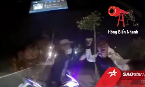 Clip: Nhóm thanh niên hung hăng chặn đầu ô tô trong đêm, liên tục chửi bới rồi cầm gạch đập phá xe