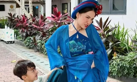 'Thị Mầu' Hoà Minzy đi đón con nhưng nó lạ lắm, quý tử ngơ ngác suýt không nhận ra mẹ