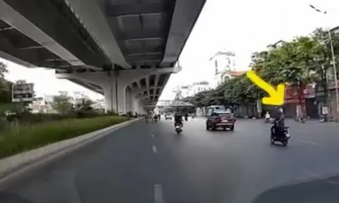 Clip: Pha chuyển làn quá nhanh khiến thanh niên phải "đo đường"