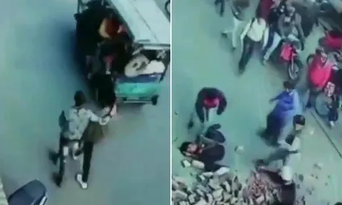 Khoảnh khắc kinh hoàng: Cả đống gạch rơi vào hai người đàn ông đang đi đường
