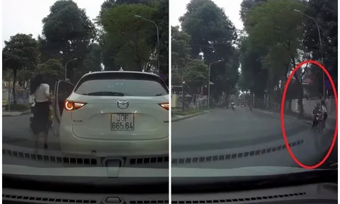 CLIP: Nữ tài xế ra hiệu dừng xe giữa ngã tư, hành động sau đó của chị khiến mạng xã hội Việt rần rần khen ngợi