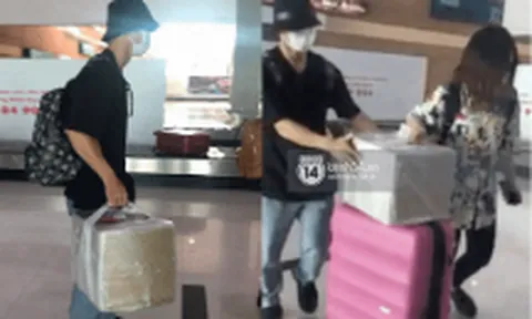 Khoảnh khắc 'ngọt' nhất sáng nay: Công Phượng xách đồ phụ vợ tại sân bay, chỉ một hành động đã thay mọi lời muốn nói!
