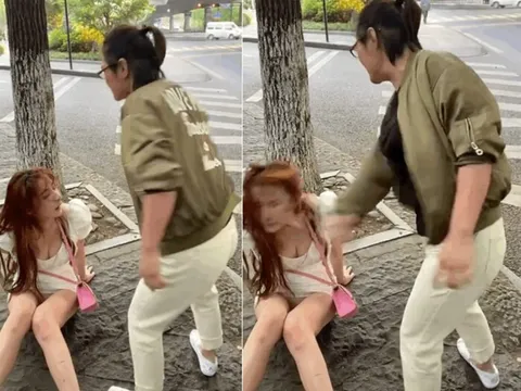 Hot girl váy ngắn bị nữ tài xế tát liên tục ngã dúi dụi xuống đất