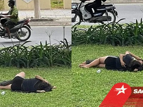 Vô tư nằm ôm ấp tình tứ ở bãi cỏ cạnh đường, cặp đôi bị chỉ trích, 'ném đá' dữ dội