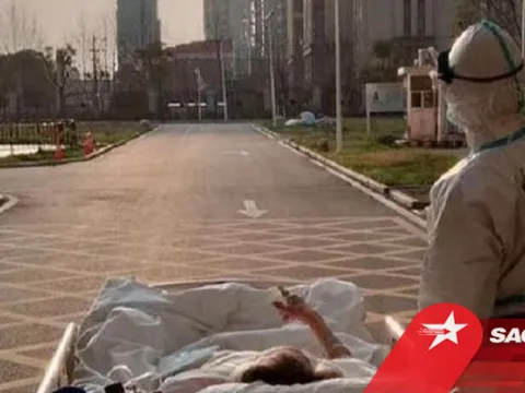 Bác sĩ cùng bệnh nhân Covid-19 ngắm hoàng hôn, khoảnh khắc bình dị làm lay động hàng triệu trái tim