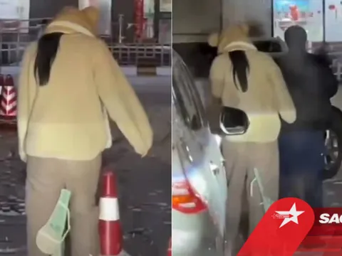 Cô gái bị vướng áo lót phía sau quần mà không hề hay biết, thản nhiên đi giữa bao lời xì xào