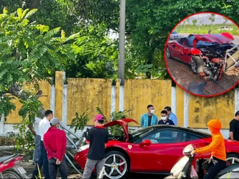 Xe sang Ferrari lao lên vỉa hè húc đổ cây xanh bên đường ở Hà Nội