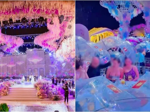Lễ cưới trăm tỉ ở Kiên Giang, mỗi người cầm 1 chiếc ô và netizen cảm thán: 'Ngồi ăn cũng kiểu mui trần'