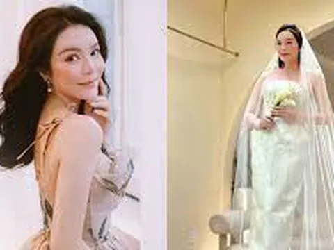 Lý Nhã Kỳ tung ảnh thử váy cưới, danh tính 'nửa kia' làm khán giả xôn xao
