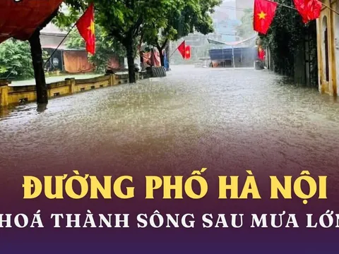 Đường ở Hà Nội hoá thành sông sau mưa lớn kéo dài