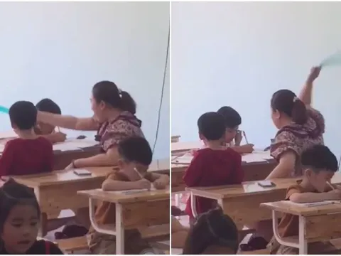 Cô giáo dùng thước đánh học sinh trong lúc dạy học