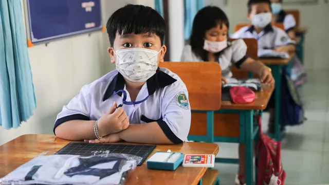 Học sinh không đến trường nếu có biểu hiện ho, sốt, khó thở...